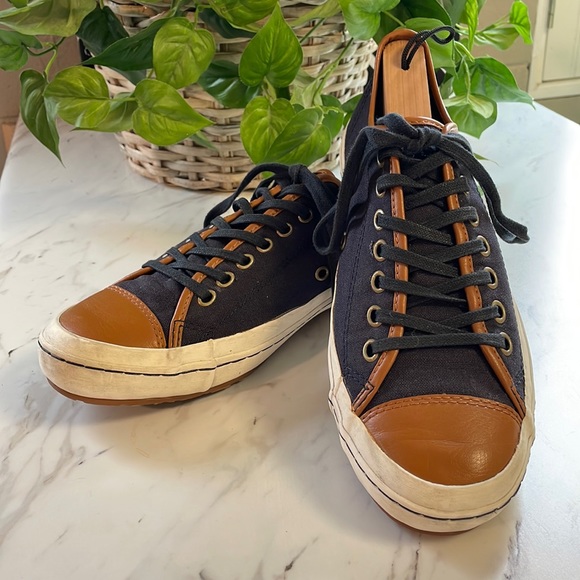 Men’s Converse All Stars navy blue with tan leather toe and edging size 9